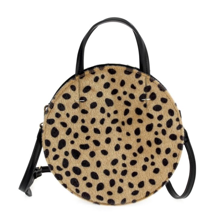 A photo of the Round About Way Handbag product