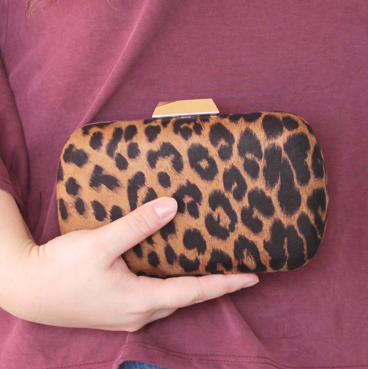 A photo of the Wild One Clutch Cross Body product