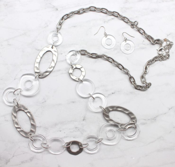 A photo of the Clear Links Earrings product