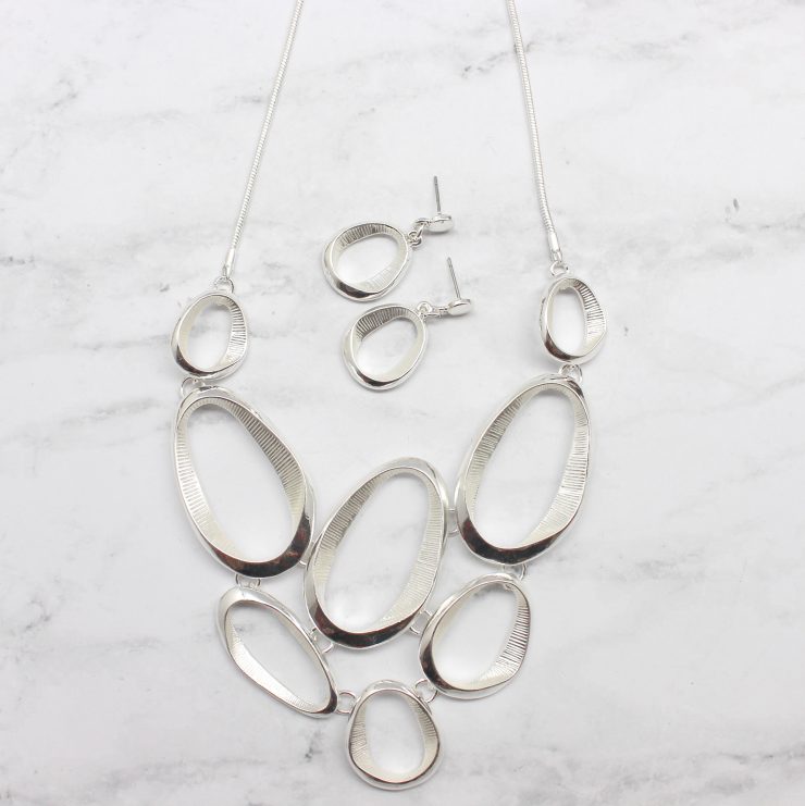 A photo of the Cutout Pebble Necklace product