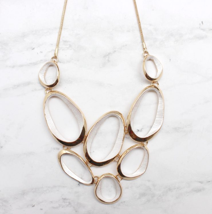 A photo of the Cutout Pebble Necklace product