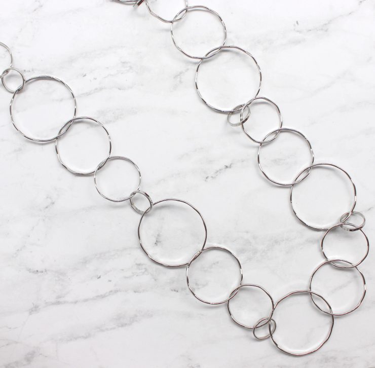 A photo of the Long Bubble Link Necklace product