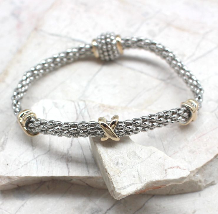 A photo of the Braided X Magnetic Bracelet product