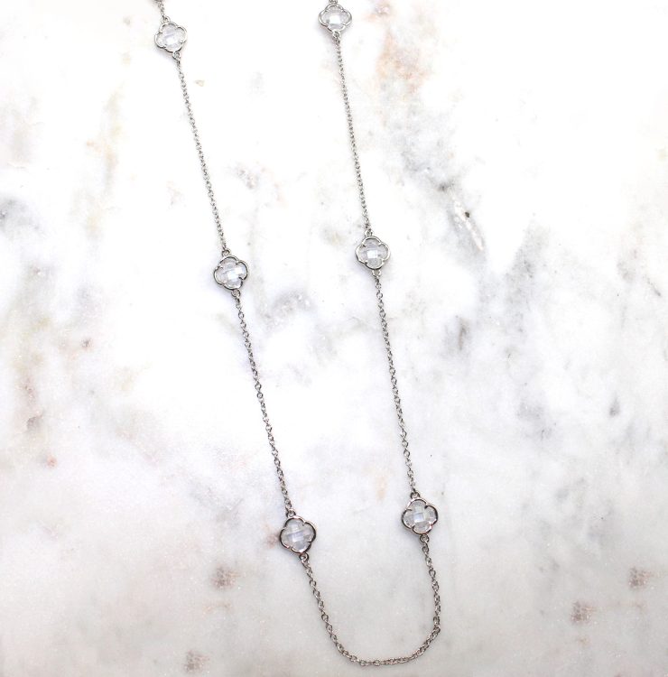 A photo of the Clear Clover Necklace product