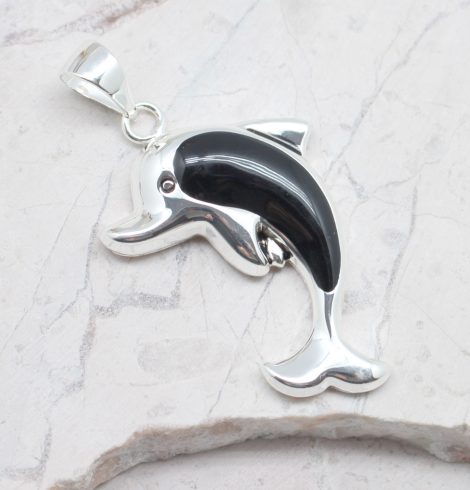 A photo of the Daring Dolphin Pendant product