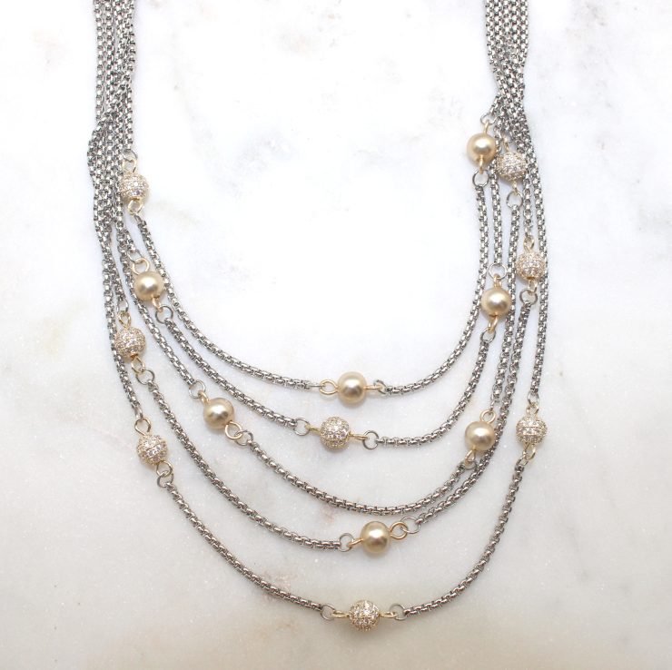 A photo of the Gold Beaded Layer Necklace product