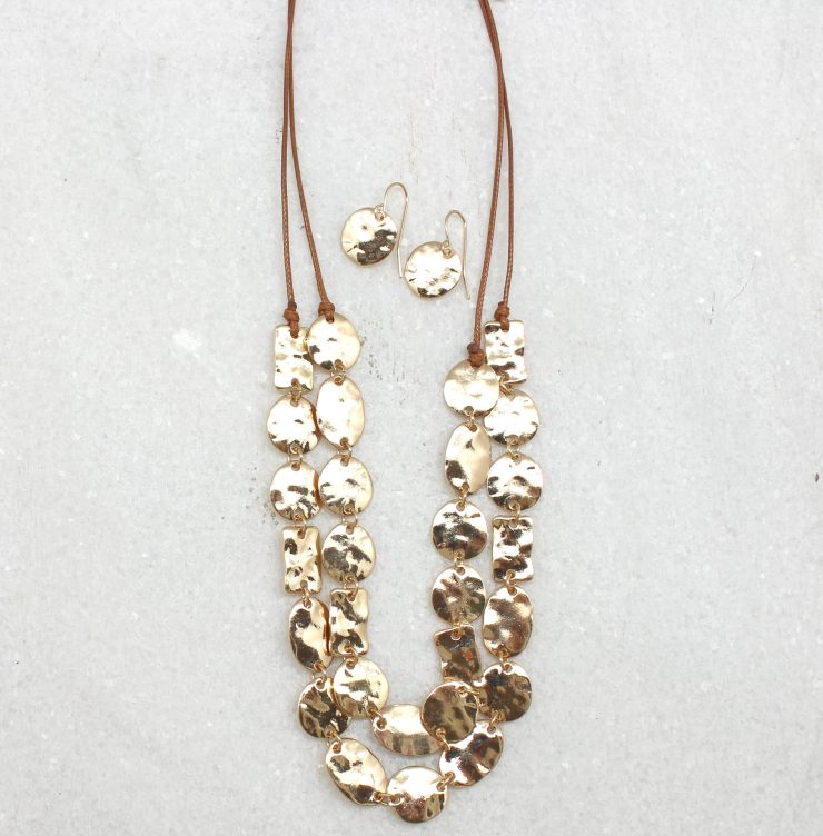 A photo of the Gold Pieces Necklace product