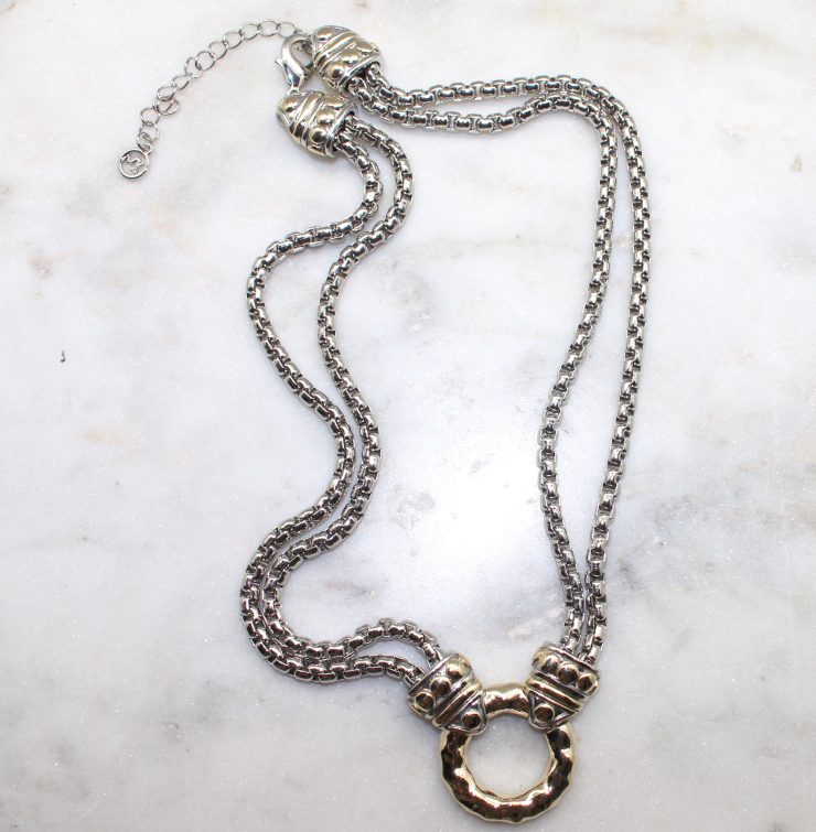 A photo of the Hammered Circle Necklace product