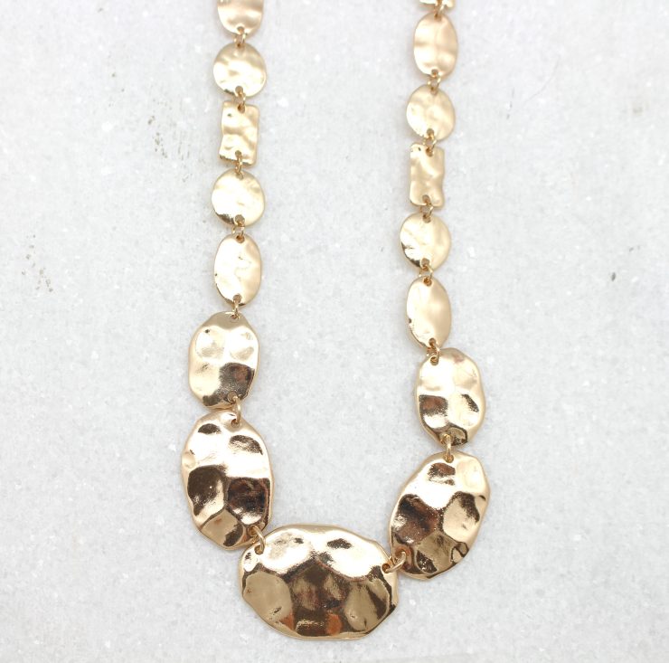 A photo of the Little Pieces Necklace product