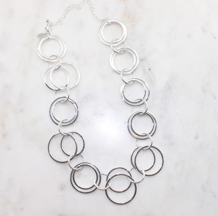 A photo of the Loopy Links Necklace product