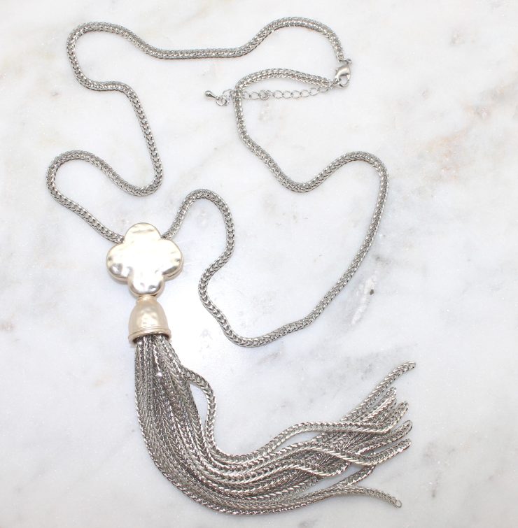 A photo of the Matte Clover Tassel Necklace product