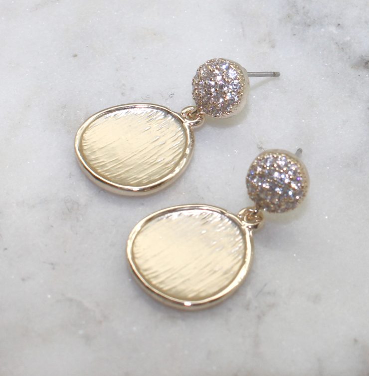 A photo of the Matte Gold Rhinestone Earrings product