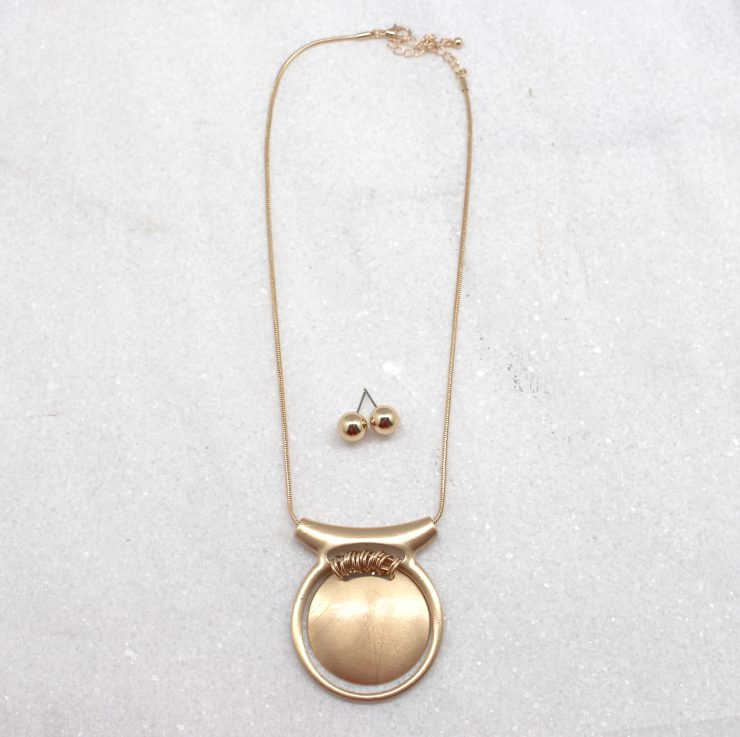 A photo of the Medallion Necklace product