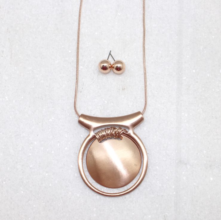 A photo of the Medallion Necklace product