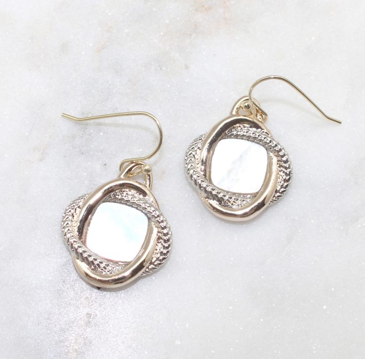 A photo of the Pearly Dangle Earrings product