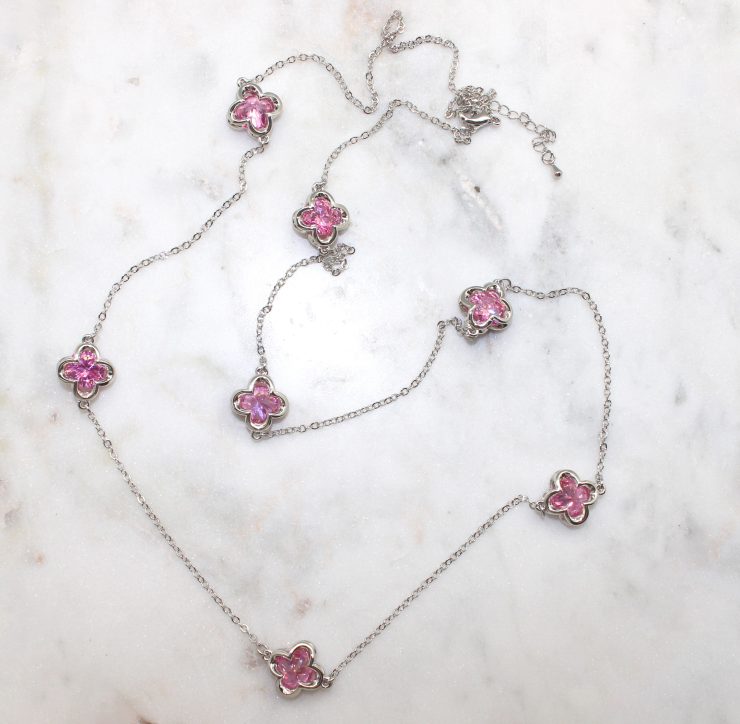 A photo of the Pink Clover Necklace product