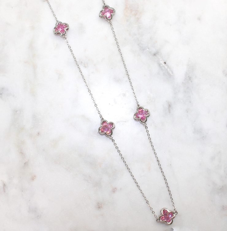 A photo of the Pink Clover Necklace product