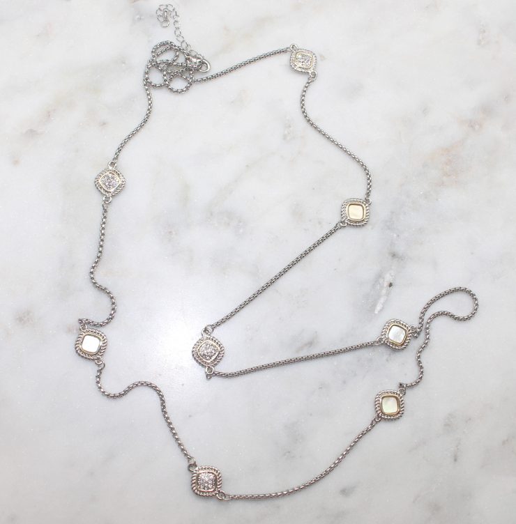 A photo of the Pearly Rhinestone Squares Necklace product