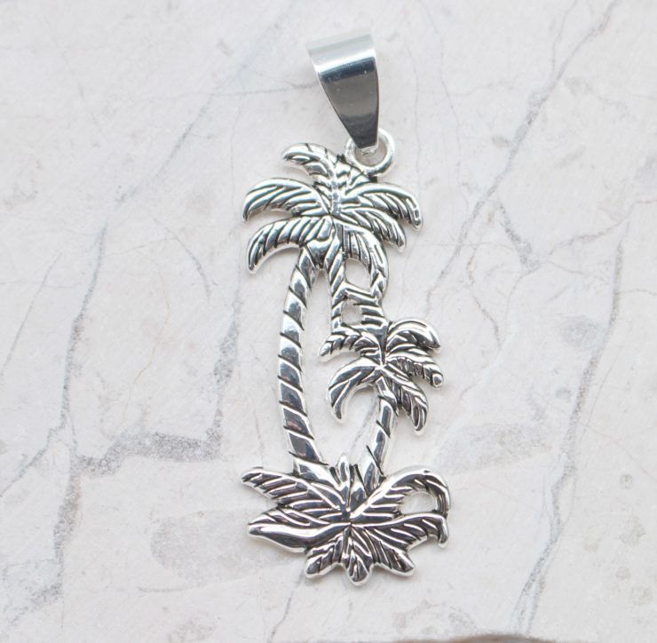 A photo of the Swaying Palms Pendant product
