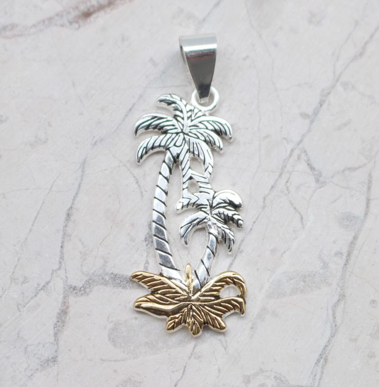 A photo of the Swaying Palms Pendant product