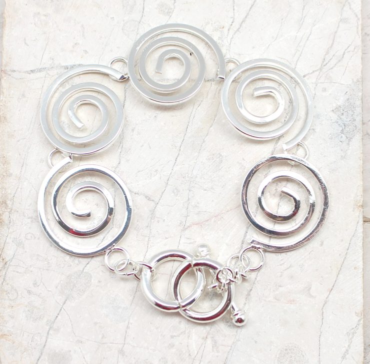 A photo of the Swirls and Curls Bracelet product