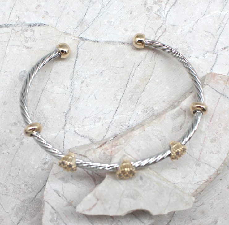 A photo of the Three Bead Cuff Bracelet product