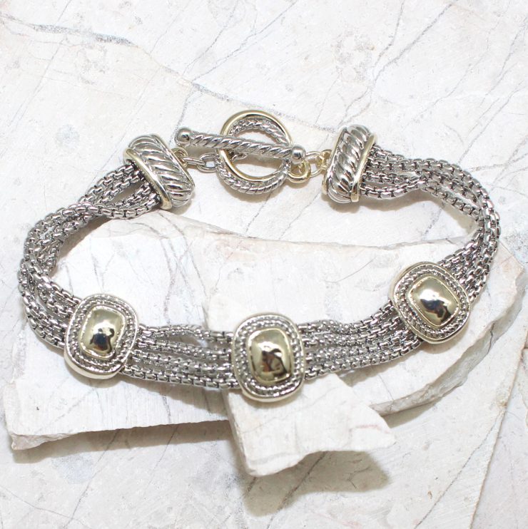 A photo of the Three Square Toggle Bracelet product