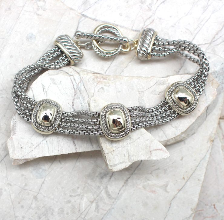 A photo of the Three Square Toggle Bracelet product