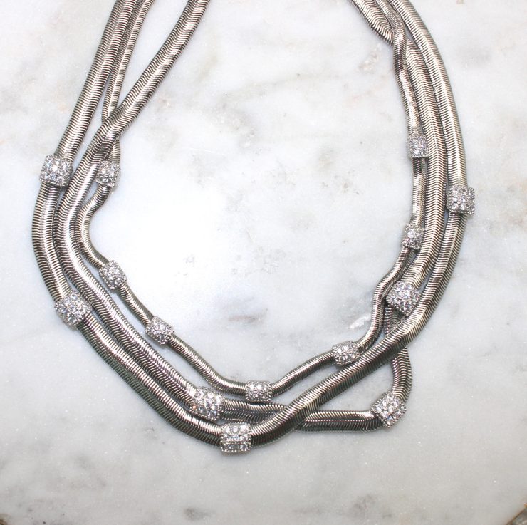 A photo of the Twisted Layers Magnetic Necklace product
