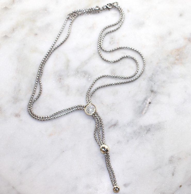A photo of the Two Tone Drop Necklace product