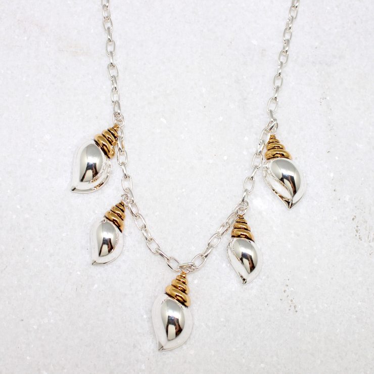 A photo of the Two Tone Shell Necklace product