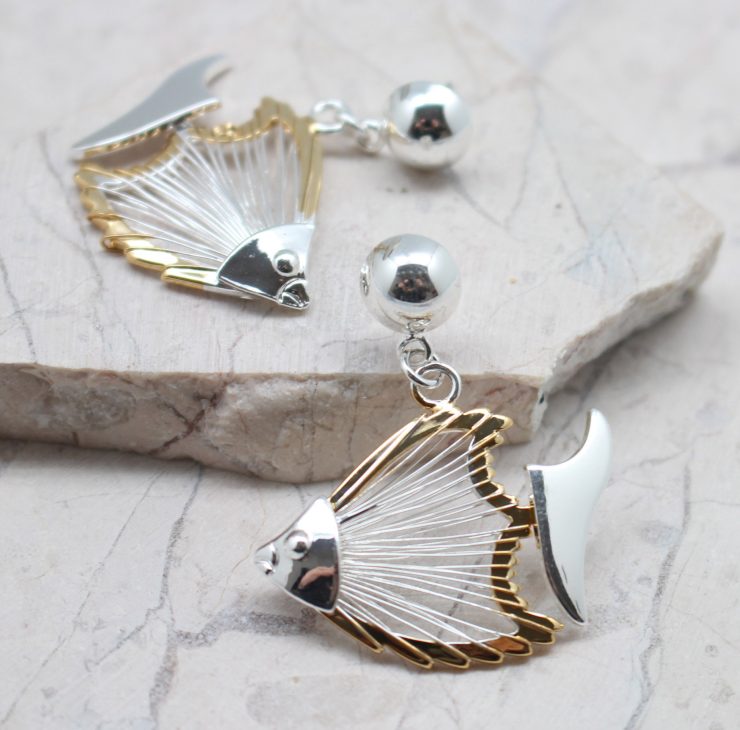 A photo of the Wire Fish Earrings product