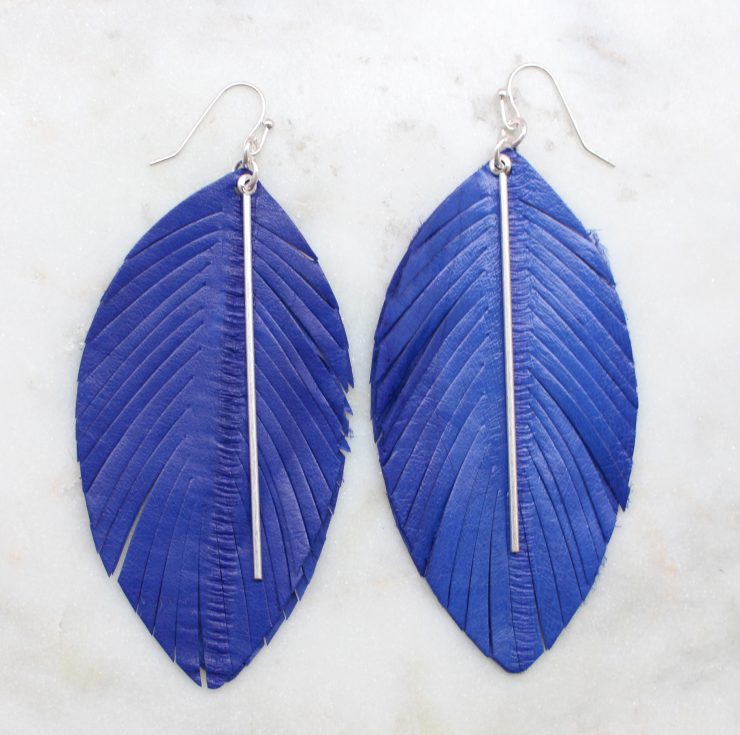 A photo of the Free Spirit Feather Earrings product