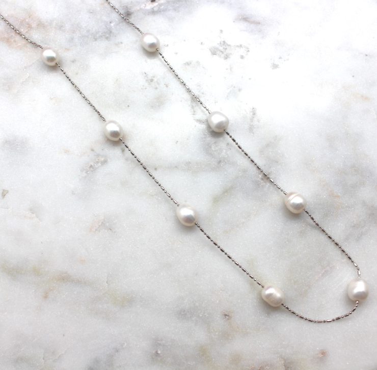 A photo of the Pearl Path Necklace product