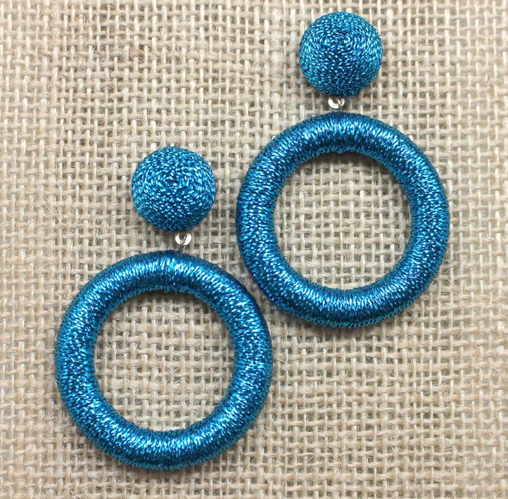 A photo of the Retro Ring Earrings product