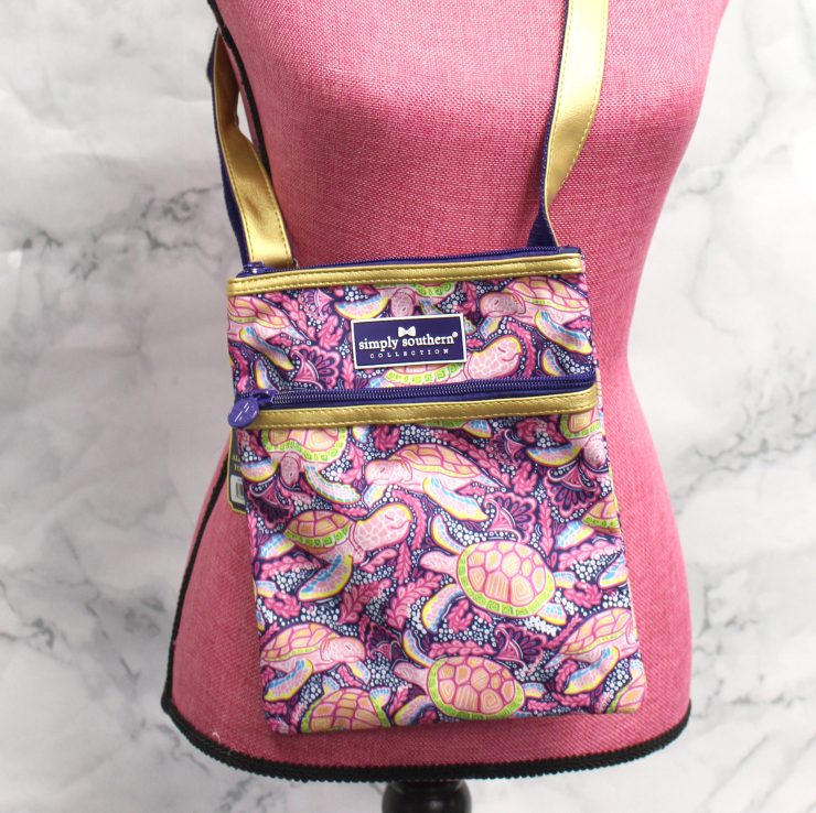 A photo of the Dancing Turtle Cross Body Bag product