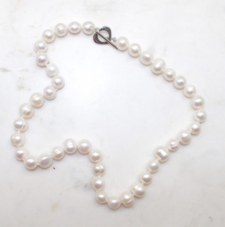 A photo of the Precious String Of Pearls Necklace product
