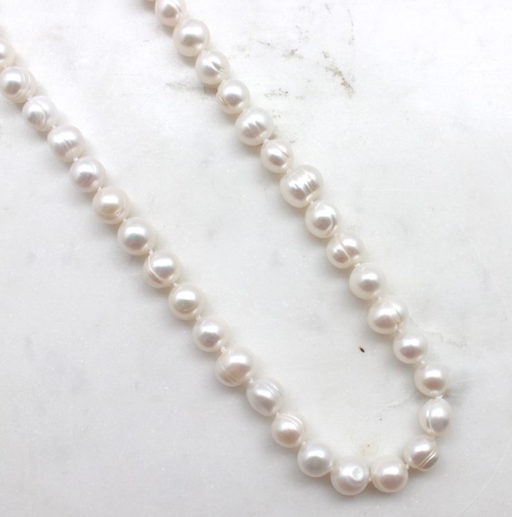 A photo of the Precious String Of Pearls Necklace product