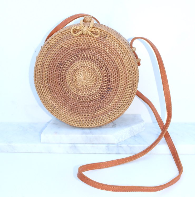 A photo of the Bow Straw Cross Body Purse product