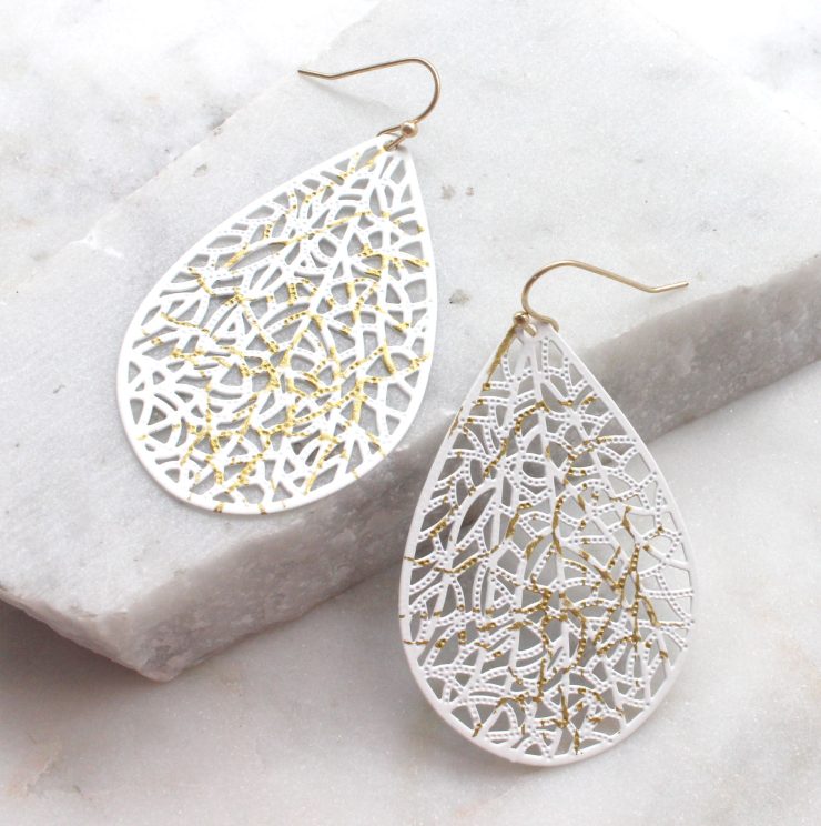A photo of the Cute Cutout Earrings product