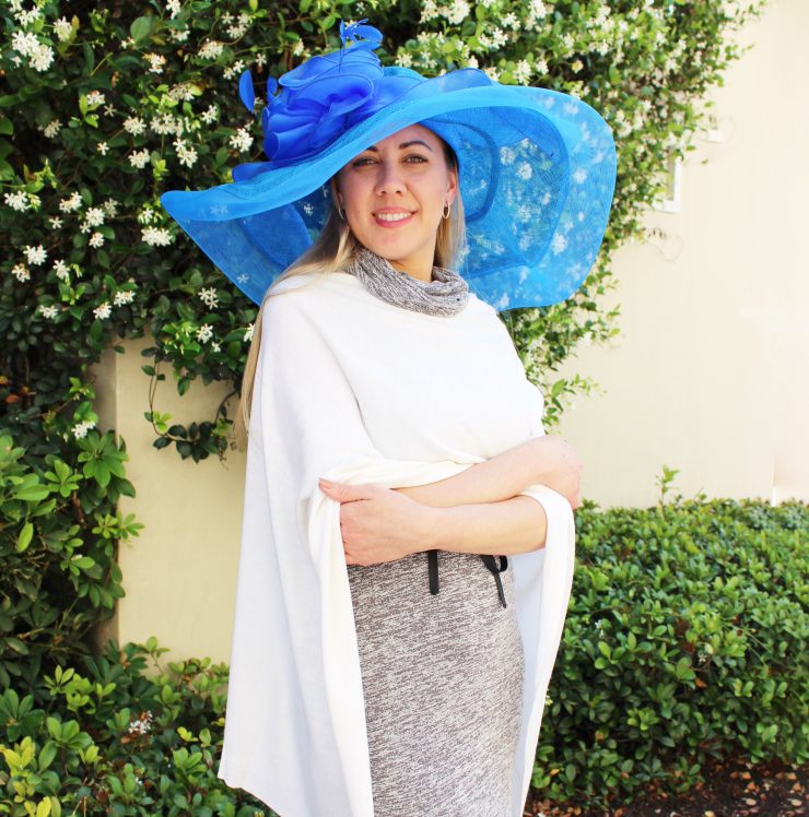 A photo of the Large Blue Feather Fascinator Hat product