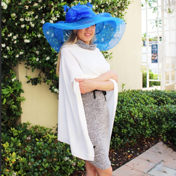 A photo of the Large Blue Feather Fascinator Hat product