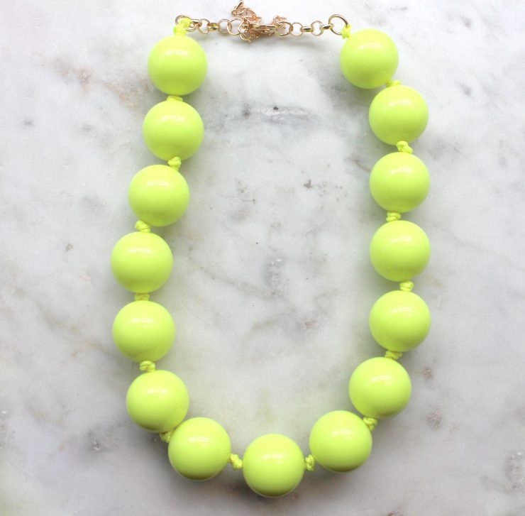 A photo of the Neon Gumball Necklace product