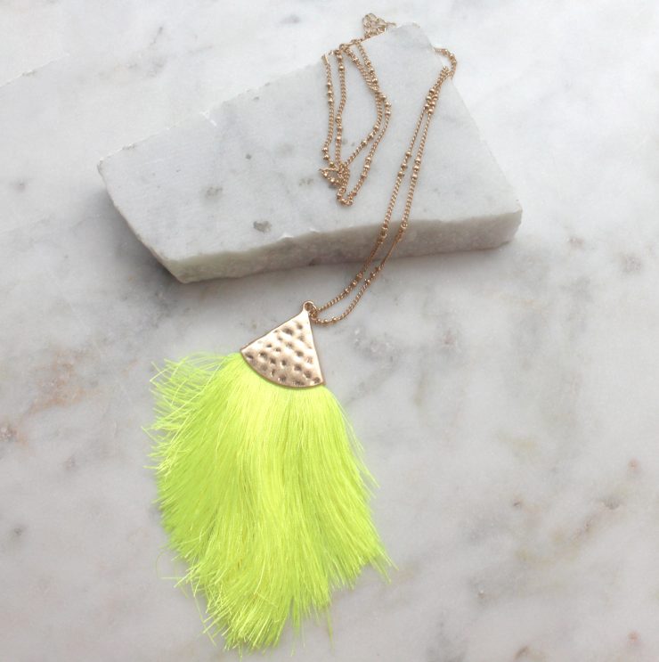 A photo of the Tassel Me Neon Necklace product