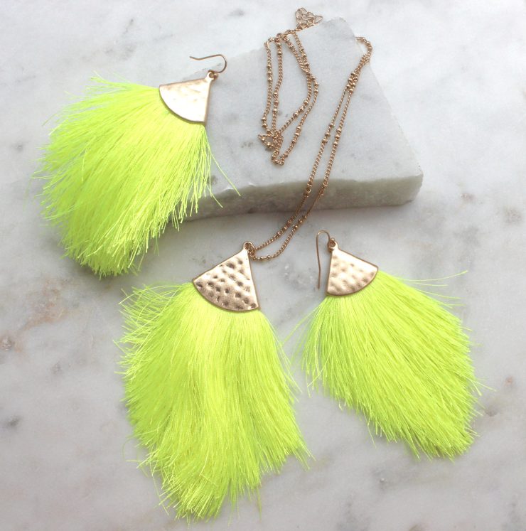 A photo of the Tassel Me Neon Earrings product