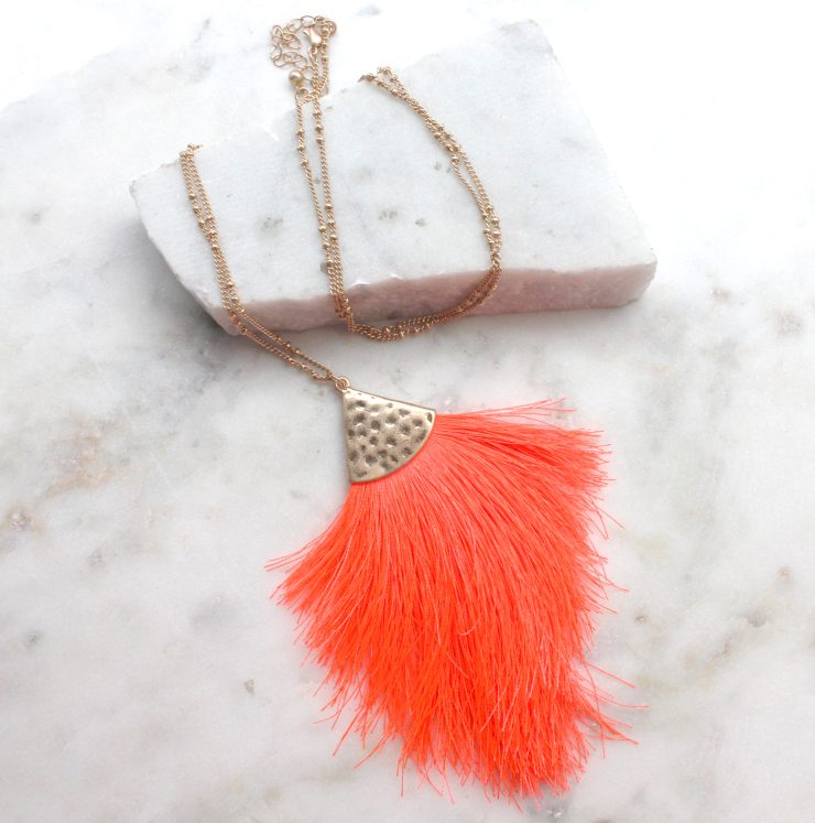 A photo of the Tassel Me Neon Necklace product