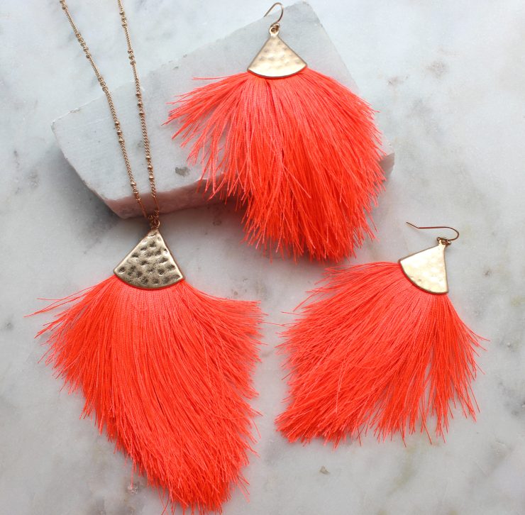 A photo of the Tassel Me Neon Earrings product