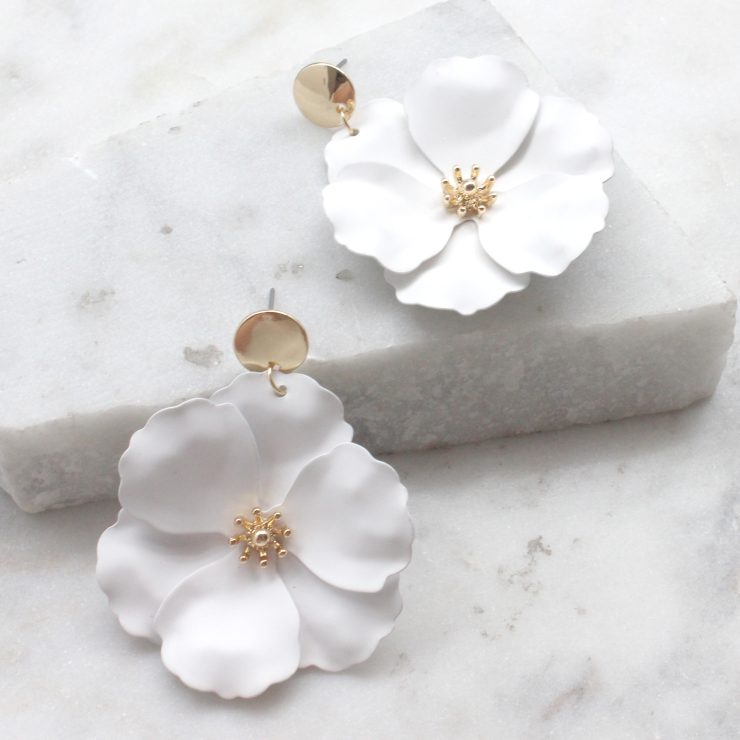 A photo of the Dazzling Daisy Earrings product