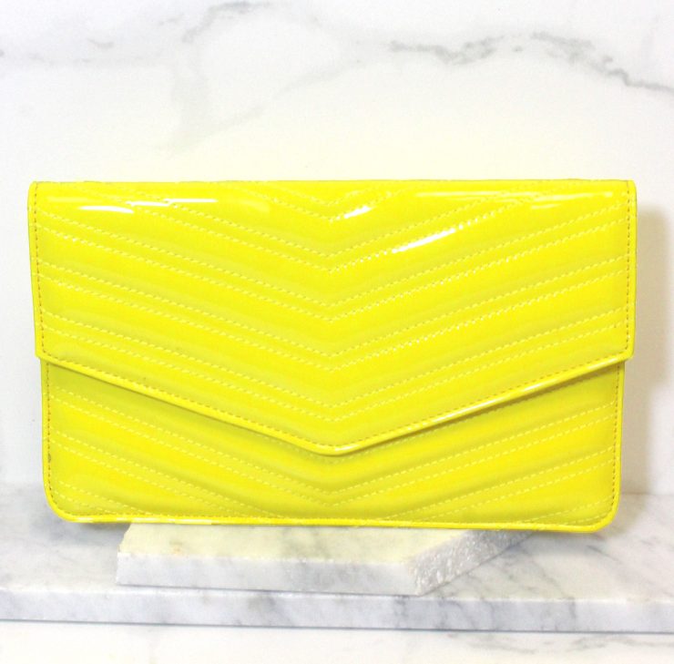 A photo of the Neon Envelope Clutch product