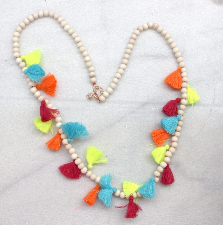 A photo of the Neon Tassel Necklace product